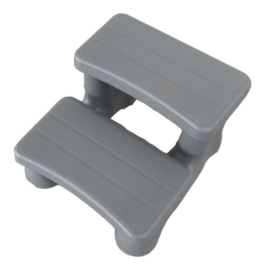 Grå trappa till utomhusspa